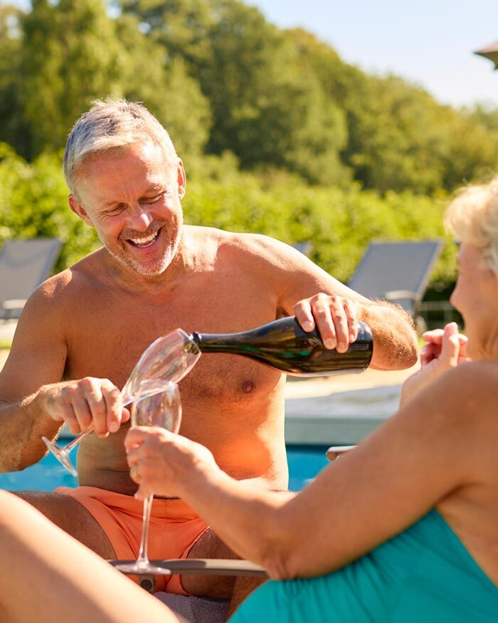 Older couple enjoying their financed outdoor living space in Fort Pierce