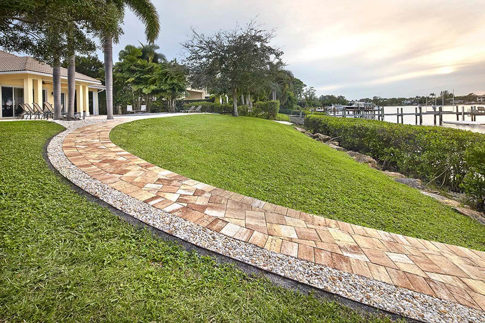 Beautiful patio and walkway installation with premium pavers and elegant design