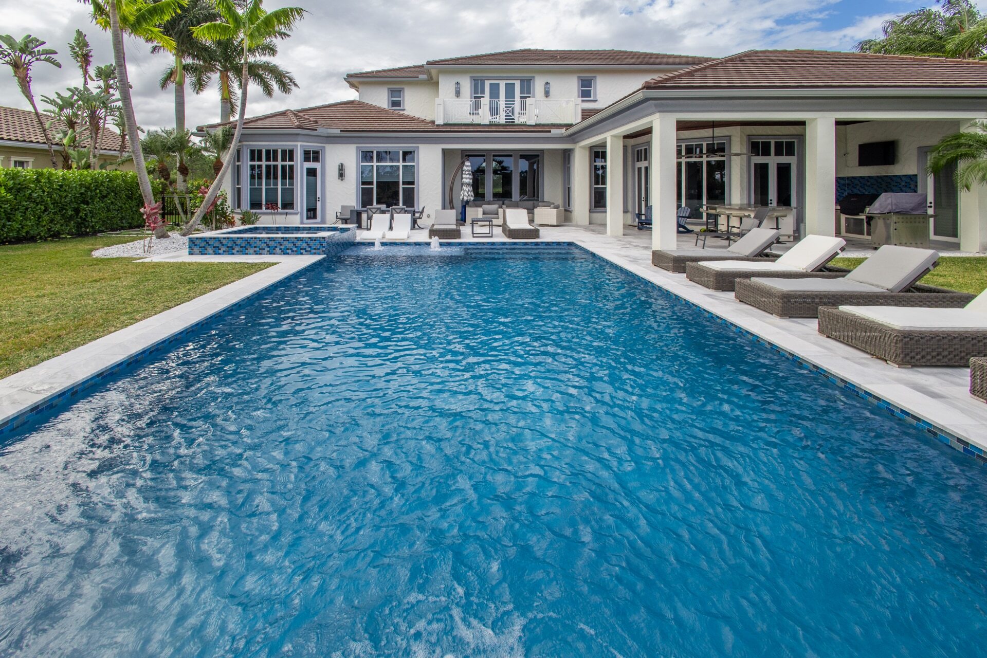 Custom pool design and construction with modern features and expert installation