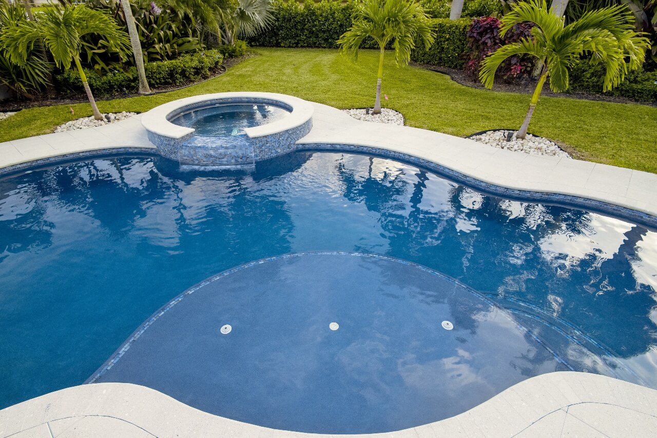 Beautiful pool renovation with modern design and premium features