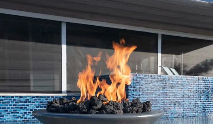 Custom fire pit and fire features for outdoor entertainment - Backyard fire element installation