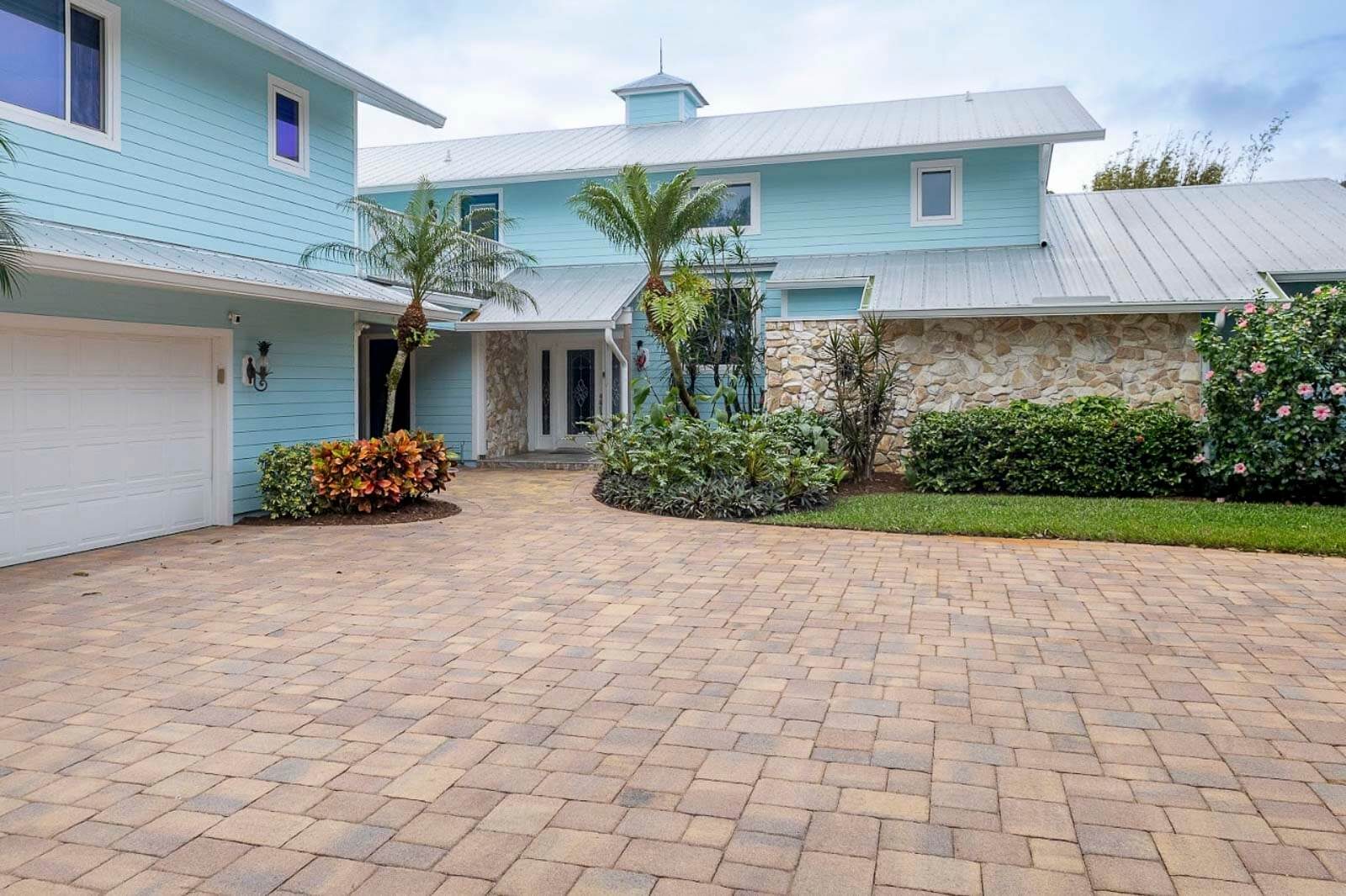 Paver maintenance and sealing with professional equipment in Vero Beach, Florida
