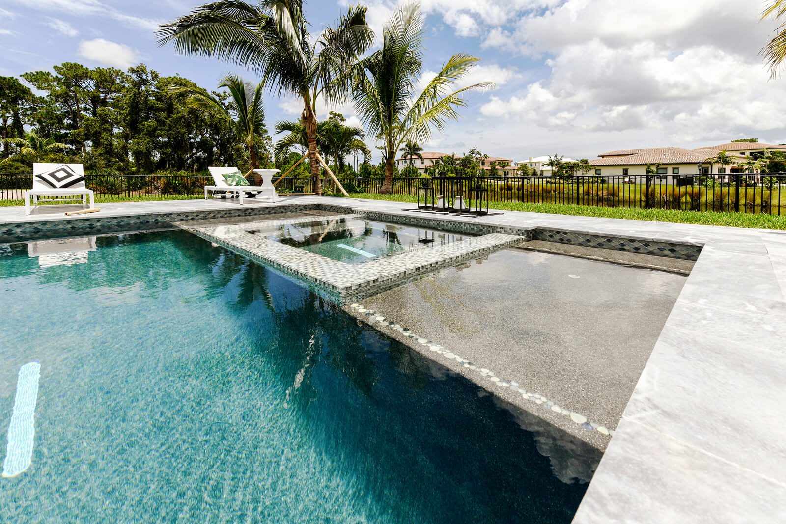 Integrated spa and pool combination with therapeutic jet features in Palm Beach, Florida