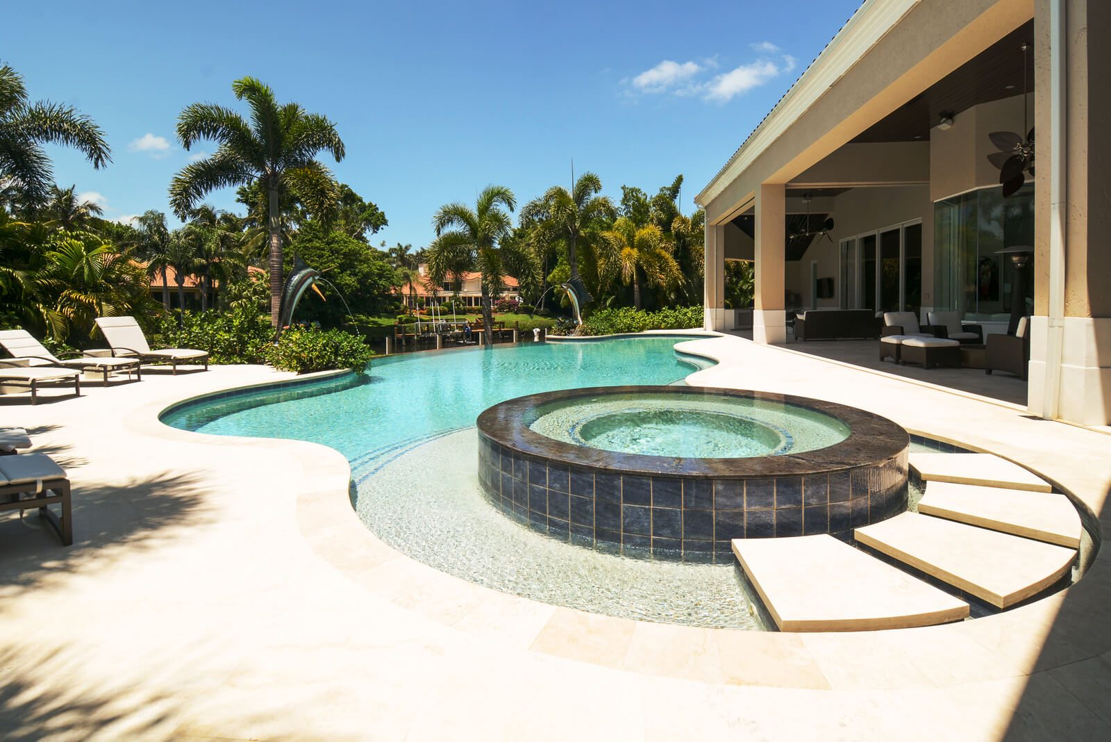 Various pool deck materials including travertine and natural stone options in Palm Beach, Florida