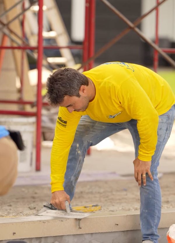 Professional pool construction process with detailed craftsmanship in Florida